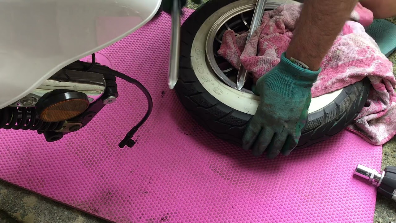 AJS Modena front tyre removal and replacement part 2