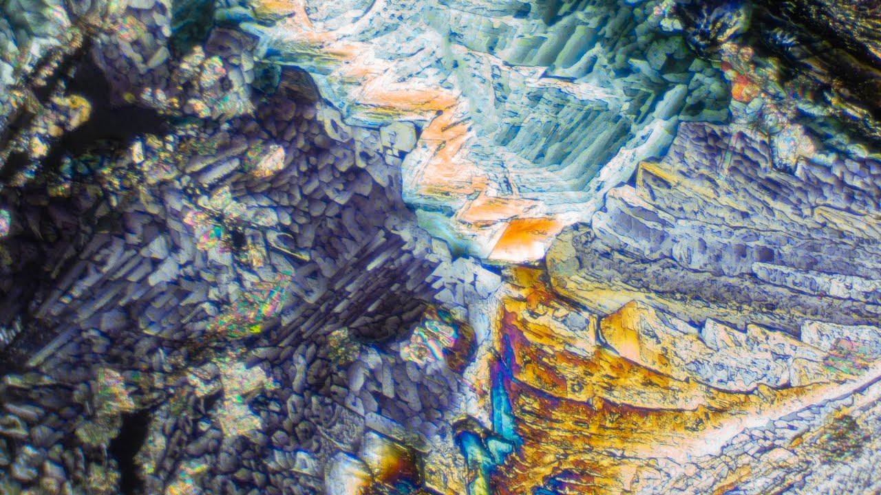 Crystals Forming Under Polarized Light - Scientific Art Time Lapse