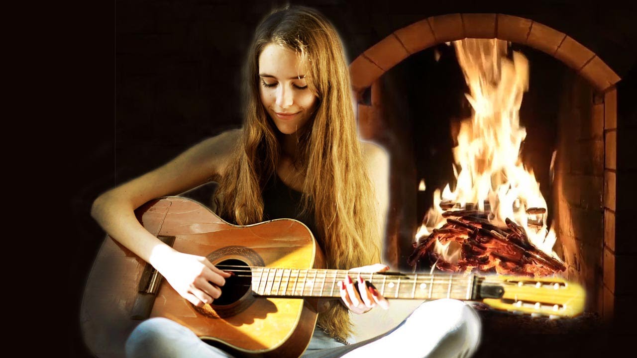 Guitare douce et relaxante au coin d'un feu de chemin&eacute;e zen, foyer cosy, relaxant