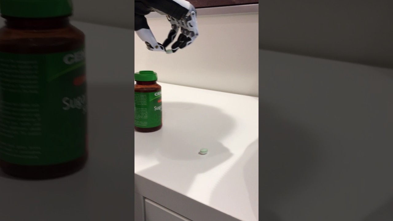 Quad amputee Korrin using Bebionic Small Hand for fine motor skill training
