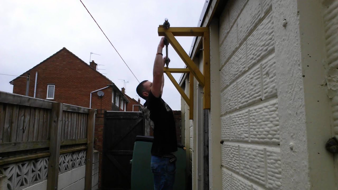Homemade wall mounted pull up bar