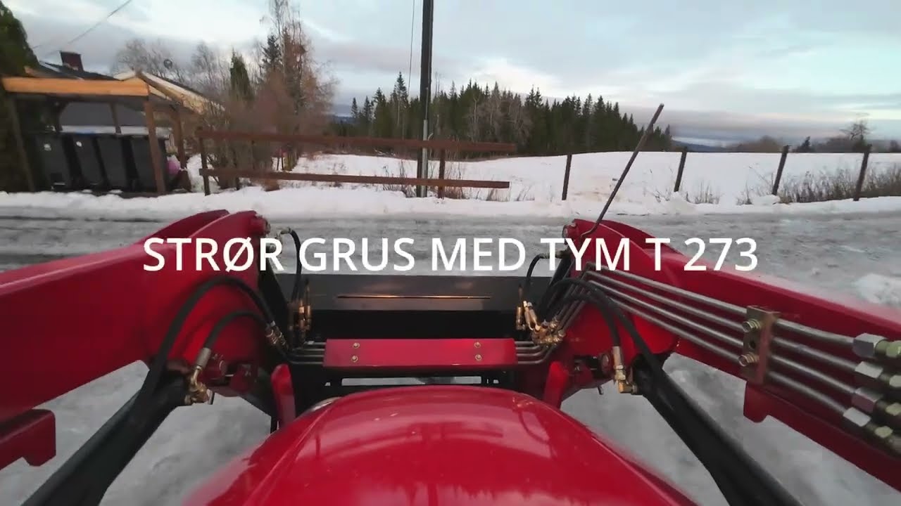 Strør grus med Tym t 273