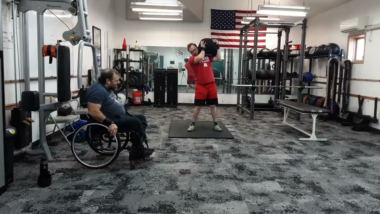 Daniel Schmitt & Barry Ridout - Leg Lift/Sandbag Clean; Chest Press/Chair Burpee Chippers