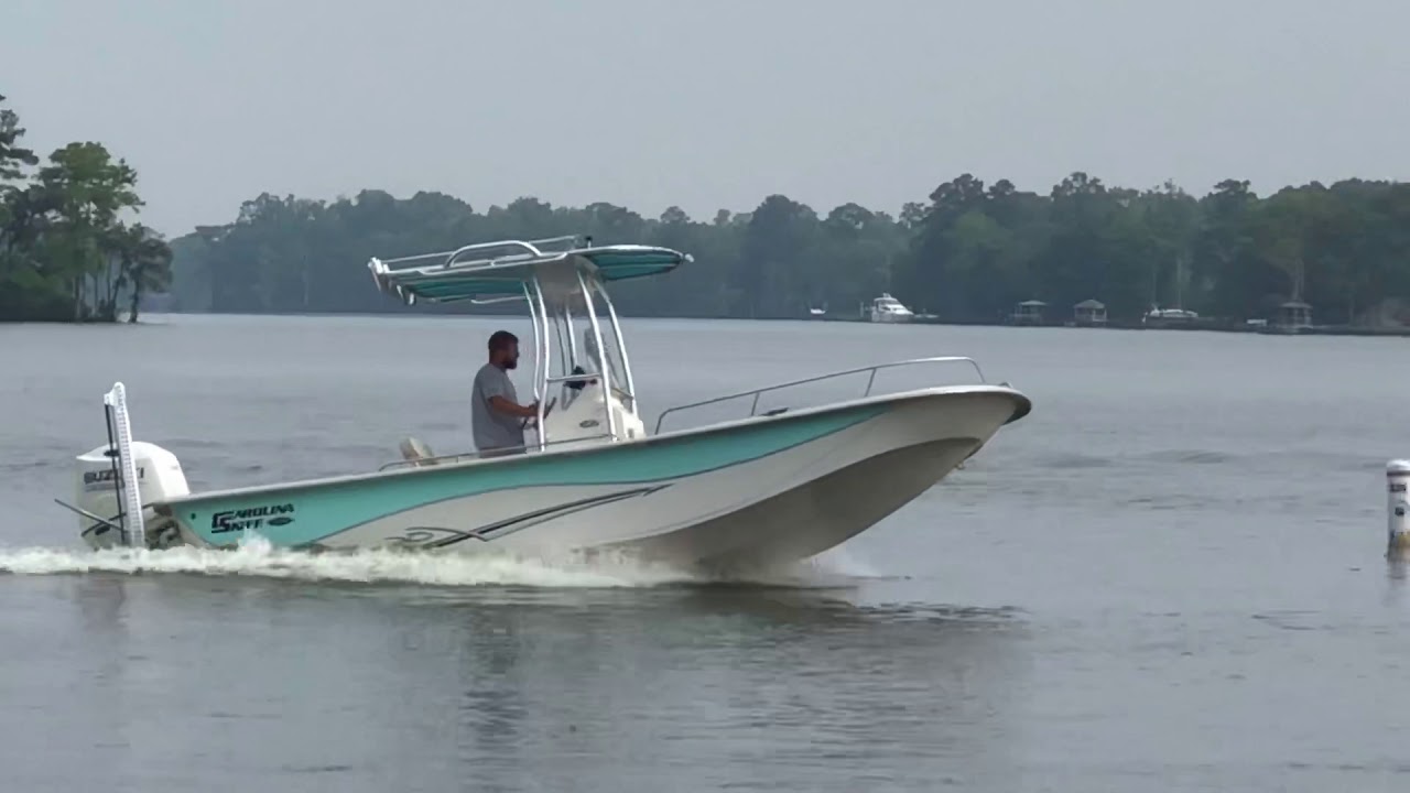 2019 Carolina Skiff 218 DLV powered by the 150 hp Suzuki 4-stroke - Atlas 6” jack plate -  trim tabs