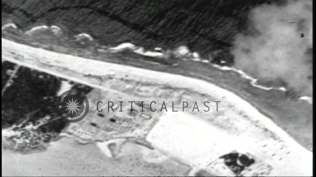 Aerial view of Marcus Island in the Pacific Ocean after it is attacked by US airc...HD Stock Footage