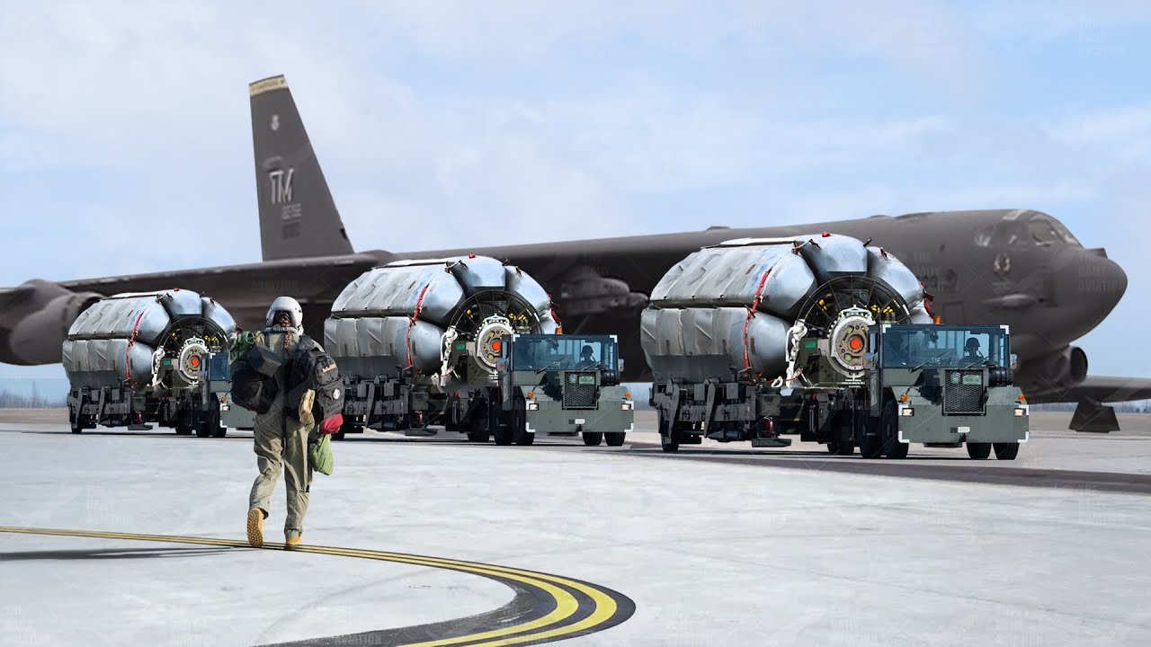 US Loading B-52 Bomber with Gigantic Rotary Missile Launchers