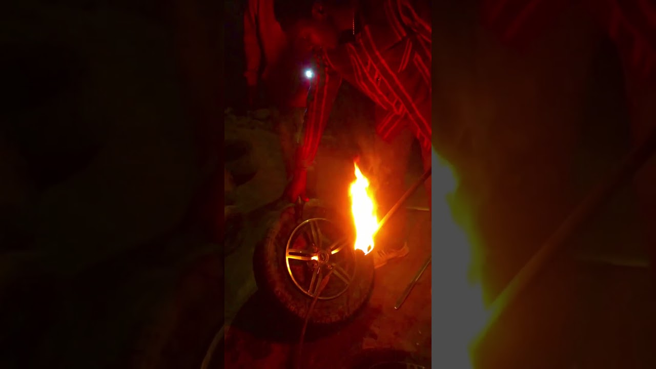 FITTING CAR TYRE WITH FIRE IN KENYA,AMAZING MUST WATCH🔥🔥🔥🔥🔥🔥🔥 #Shorts #Ytshorts