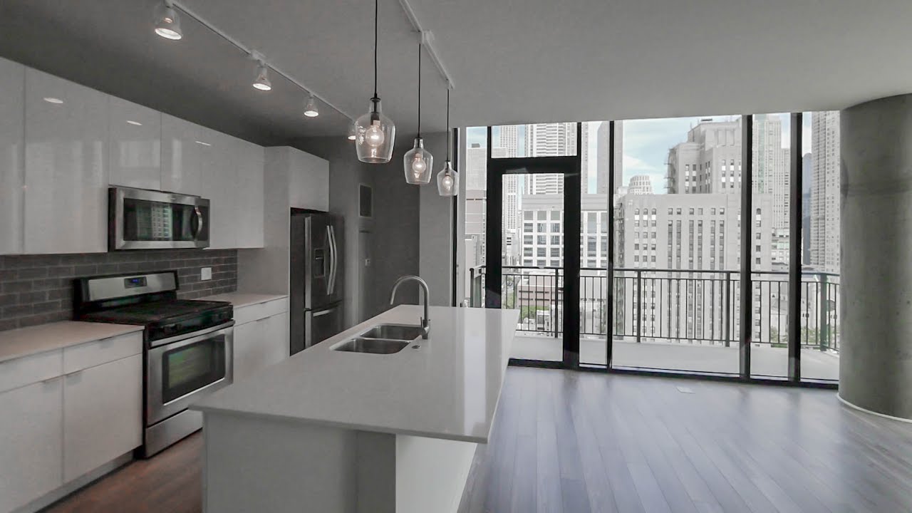 Tour a southeast corner 2-bedroom, 2-bath at River North's new Aurélien apartments