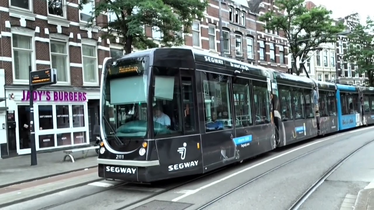 Rotterdam Netherlands: Rotterdamse Elektrische Tram (RET) 2111 Alstom Citadis 302 Tram On Nieuwe