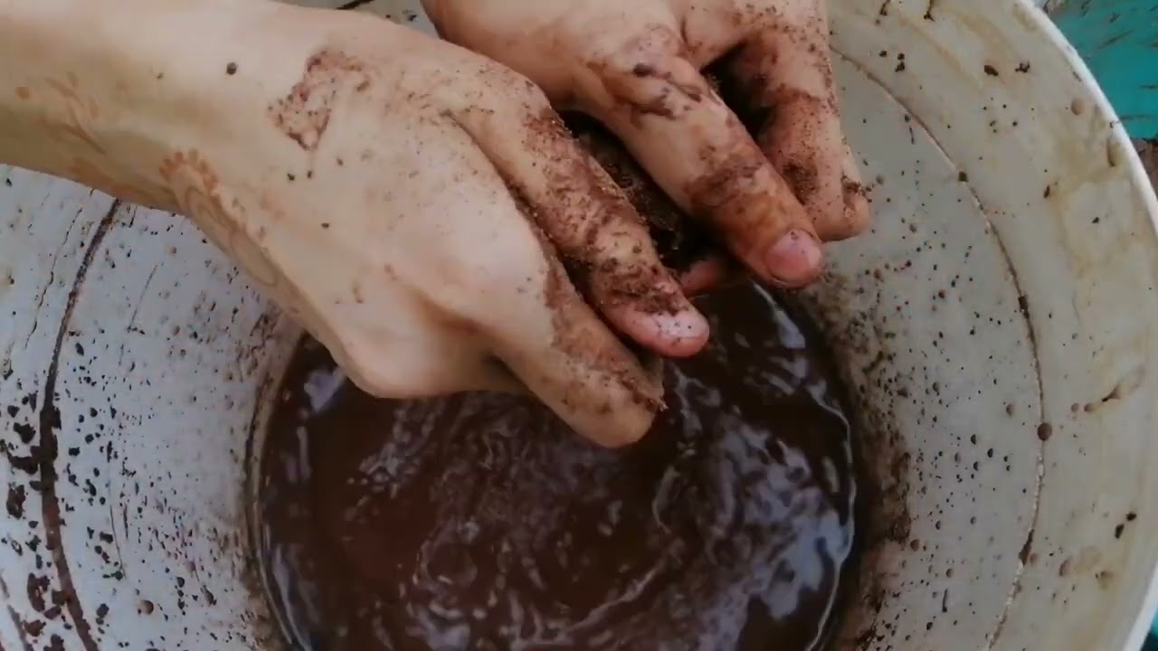 Pure Red Dirt Balls Crumbling in Water
