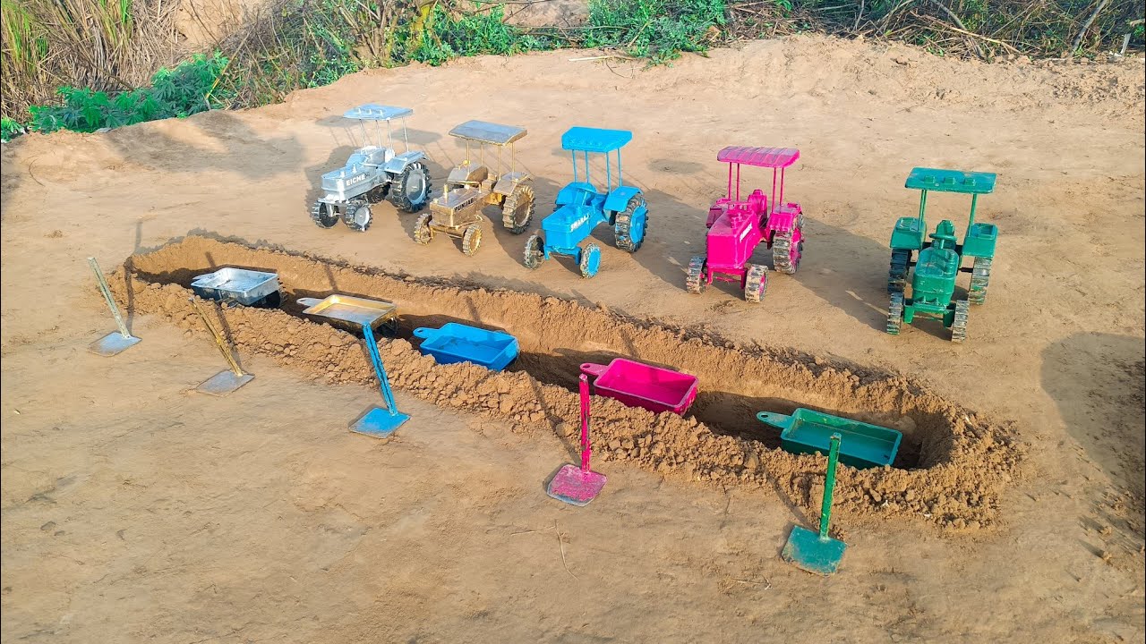 The tractor trolley stopped inside the watering can#281