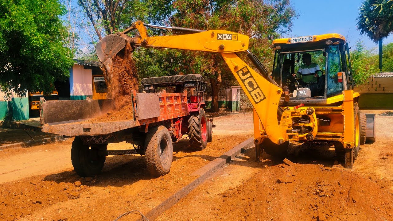 Jcb 3dx backhoe soil loading and unloading with mahindra 415 di tractor from school 
