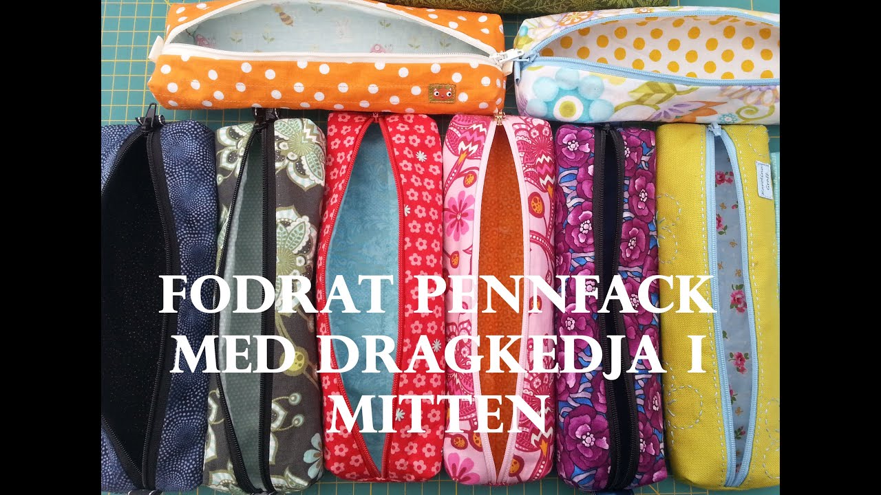 Fodrat pennfack med dragkedja i mitten