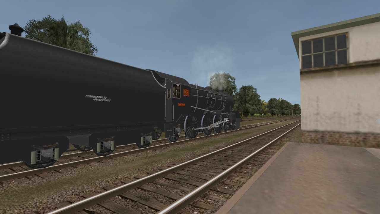Locomotora Vulcan Foundry, clase 12K Saliendo de Alejandro Korn tras parada para cargar agua(1949)