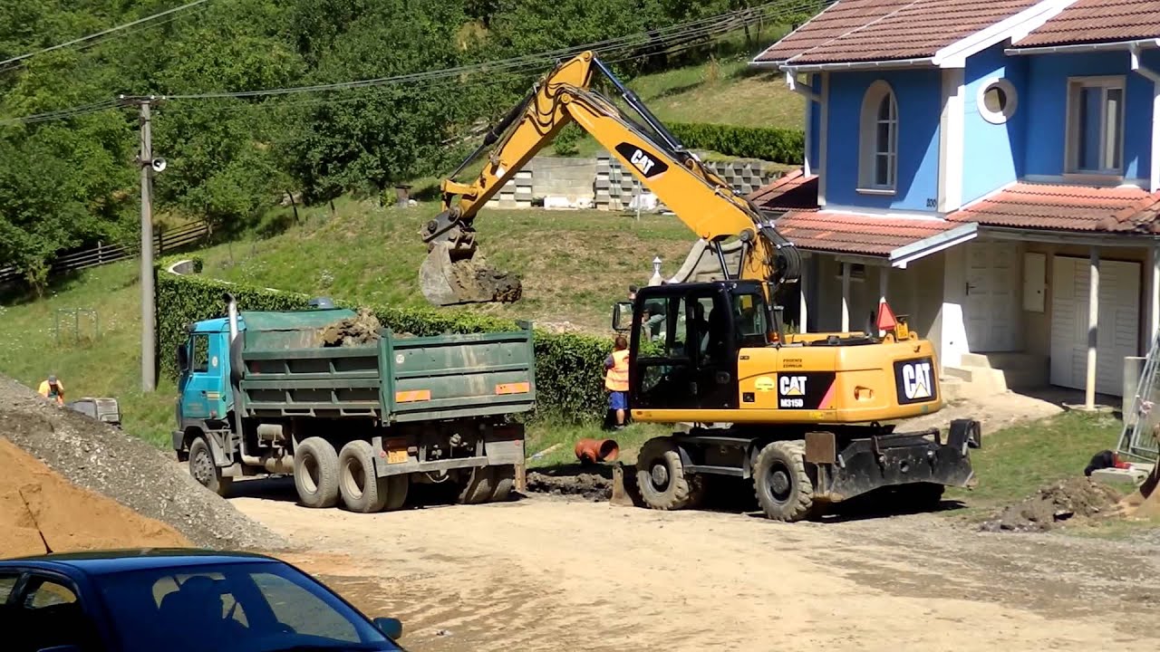Cat M315D nakl&aacute;d&aacute; Tatru 815