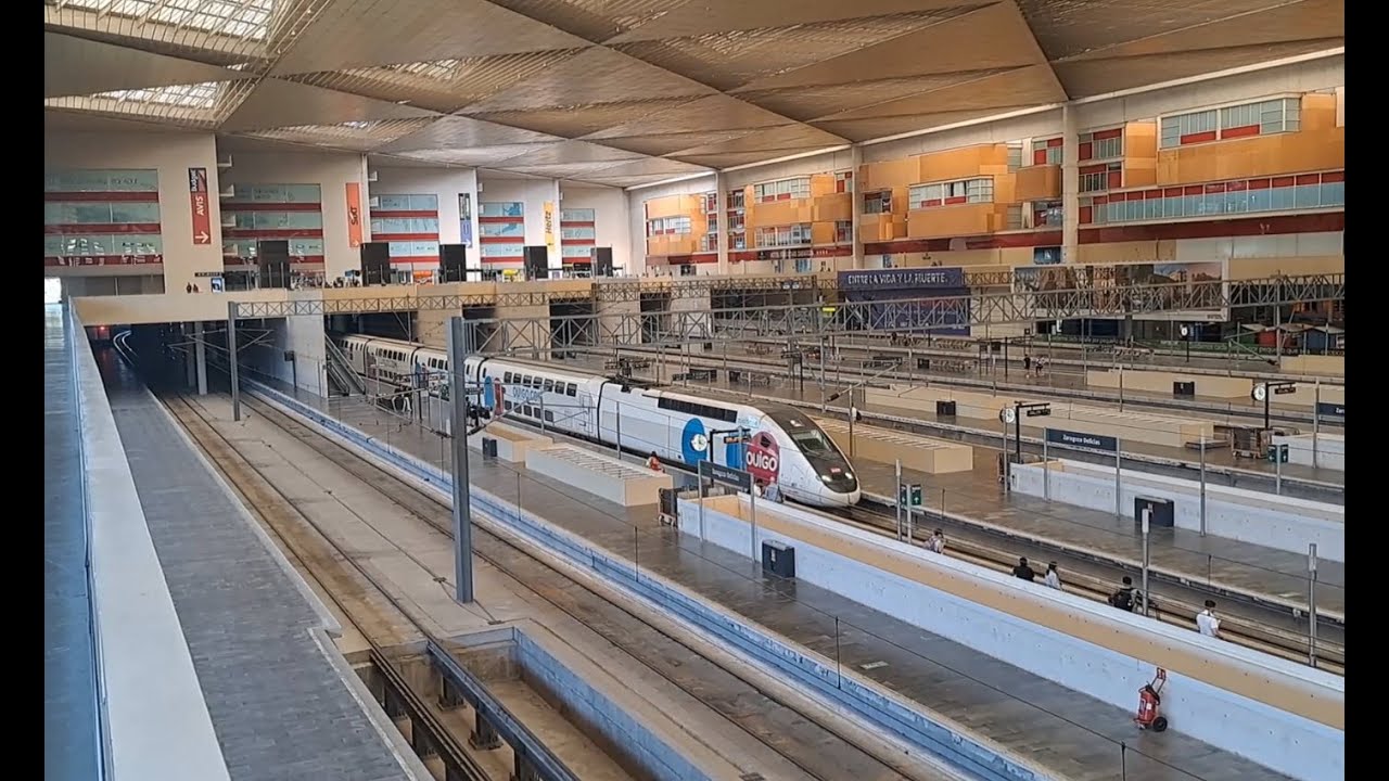 Large TGV Duplex arriving and departing - High speed train Spain