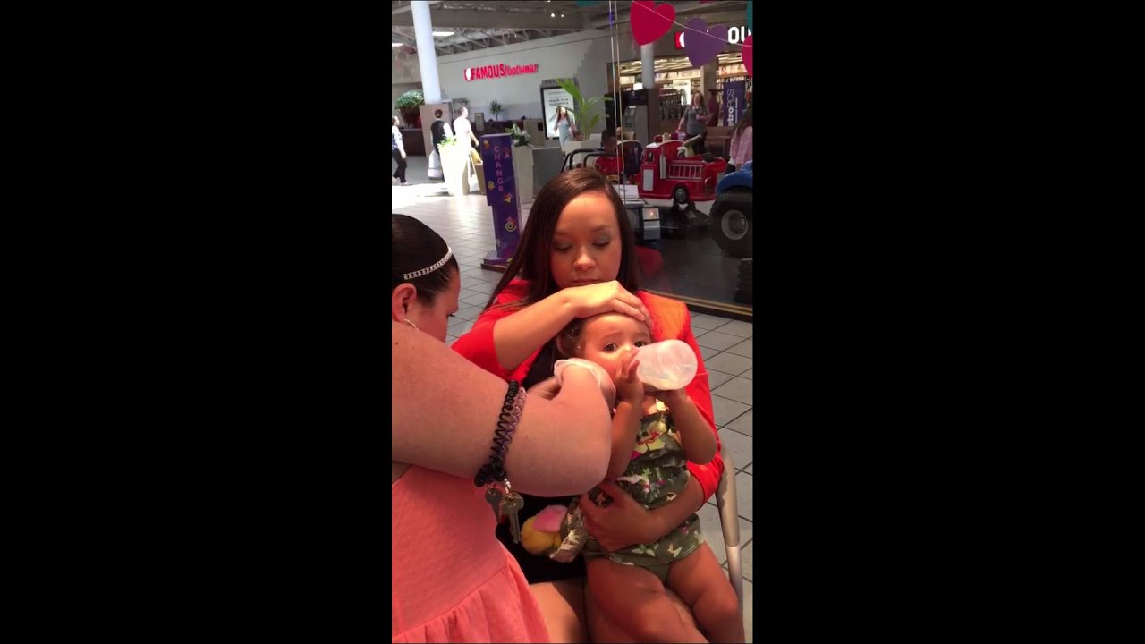 Baby Milan gets her ears pierced