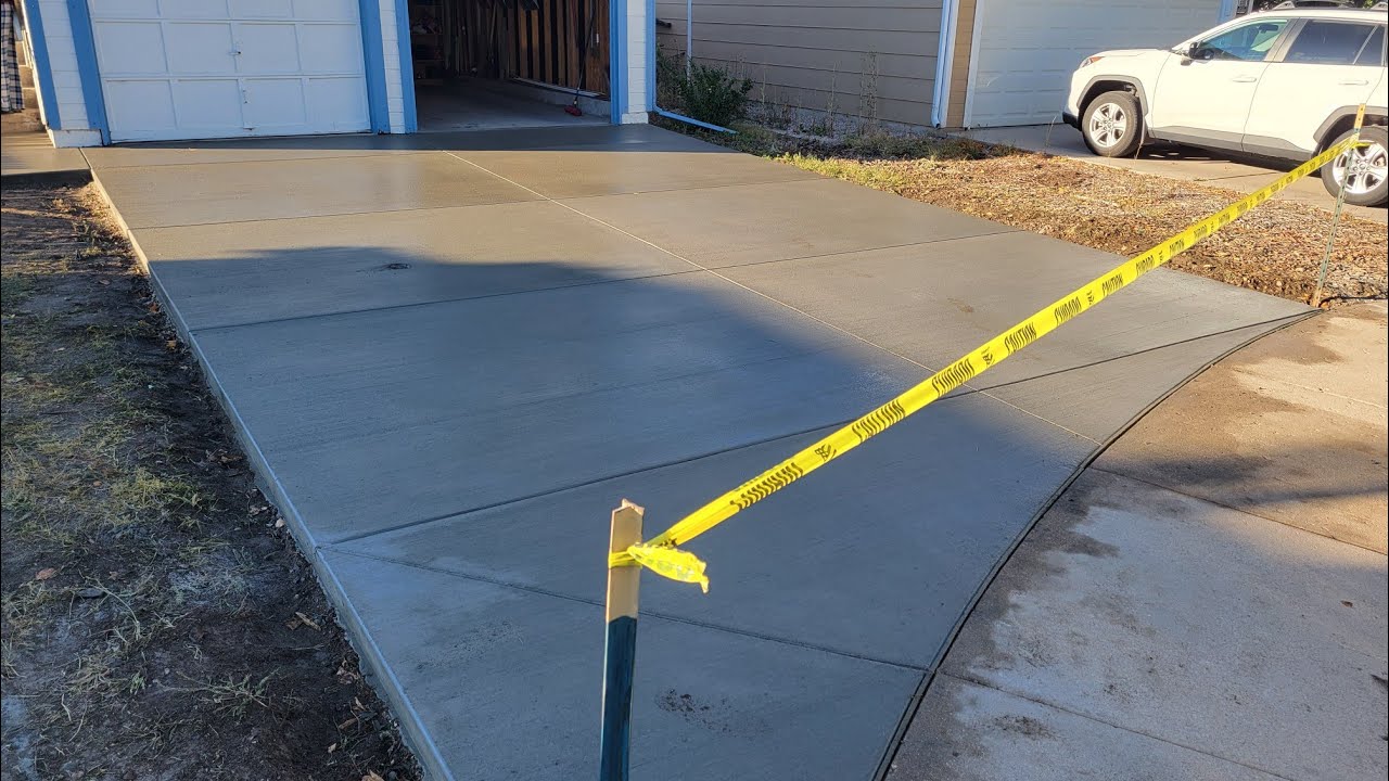 Concrete driveway tear out and pour.