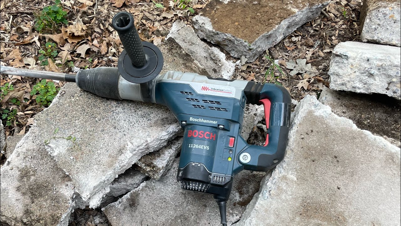 Busting up a concrete step for EZ removal with the Bosch 11264EVS