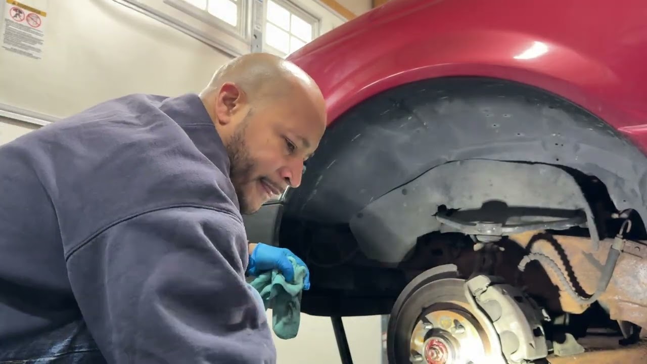 how to tighten a wheel bearing on ford ranger 2001