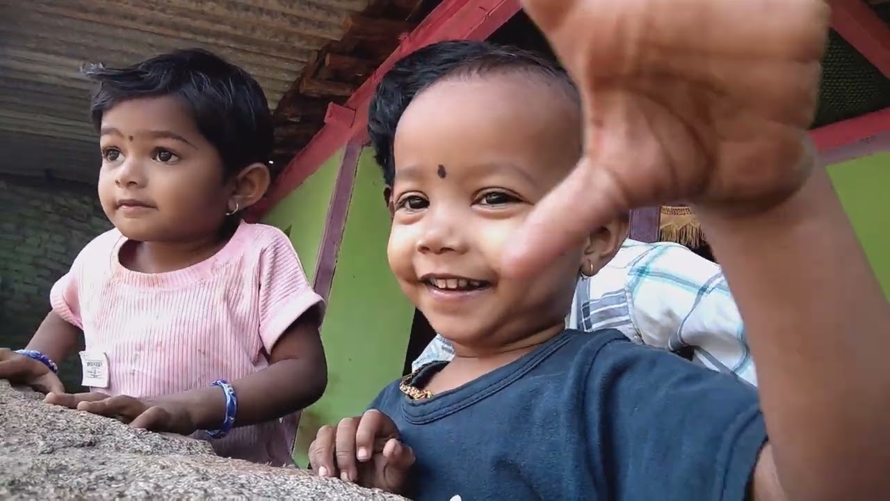 Playing with a sweet baby boy and baby girl while they talk in front of the camera 💛