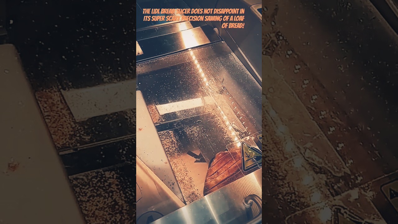 The Lidl bread slicer showing it's awesome effortless cutting of a loaf of bread #lidl #breadslicer