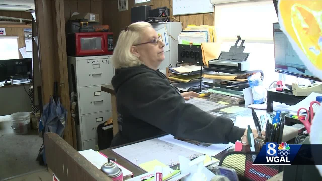 Office manager of salvage yard in York County returns items found in cars about to be destroyed