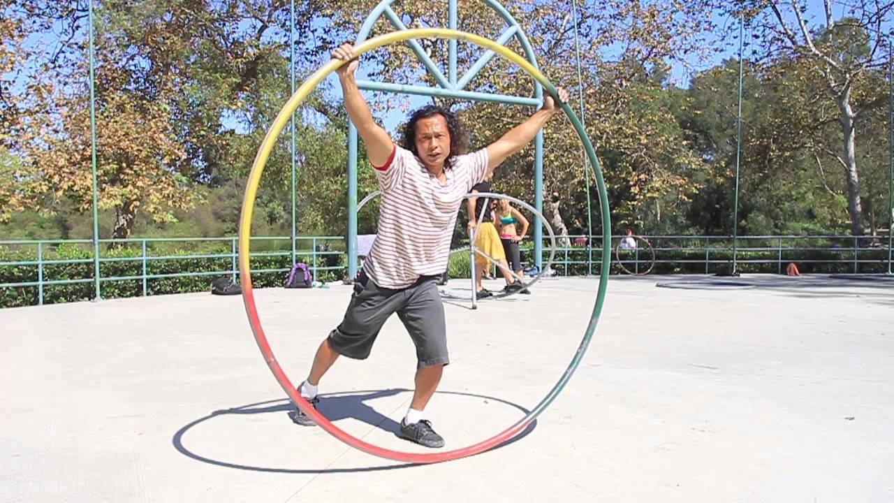 Superman tutorial: How to learn the superman hang in Cyr / Simple  Wheel