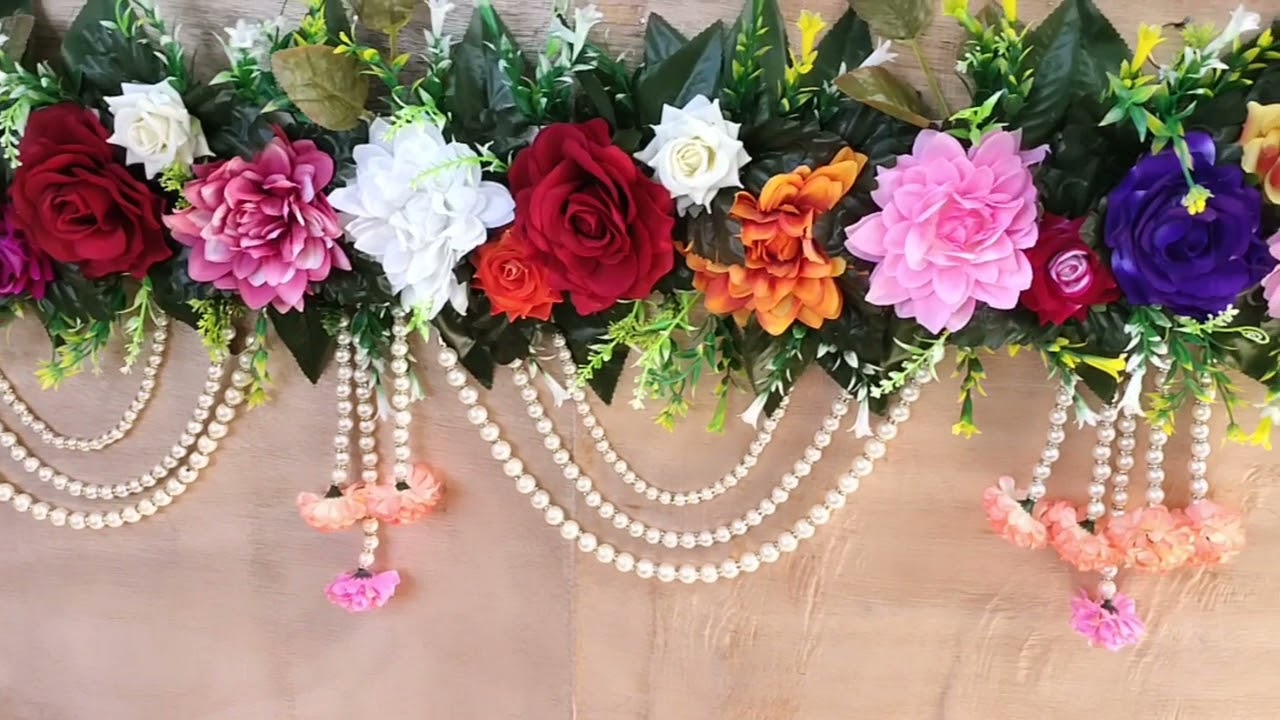 Door hanging (artificial floral ) whatsapp 7875211201 for more