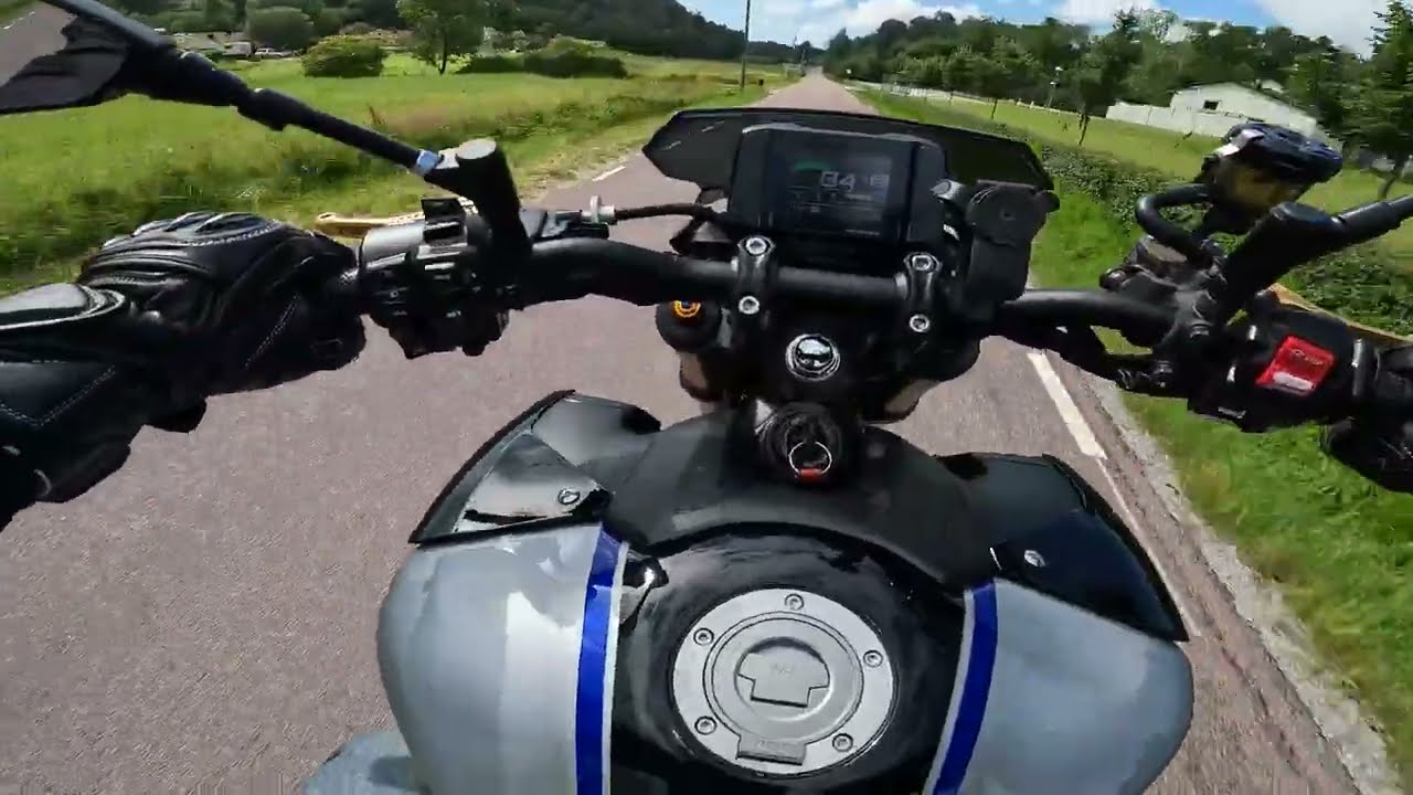 Biker Outriding The Rain