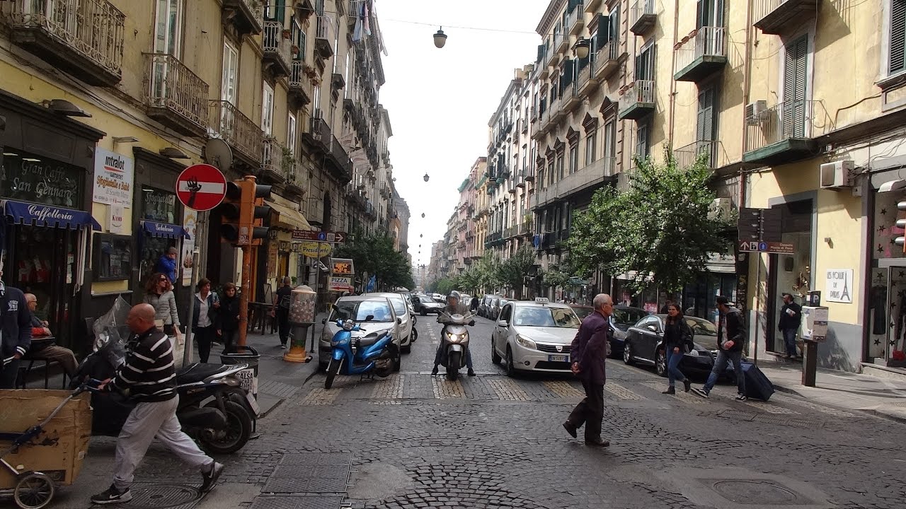 Italy, Naples: An amazing walk around Naples showing the crazy traffic / people / street sellers