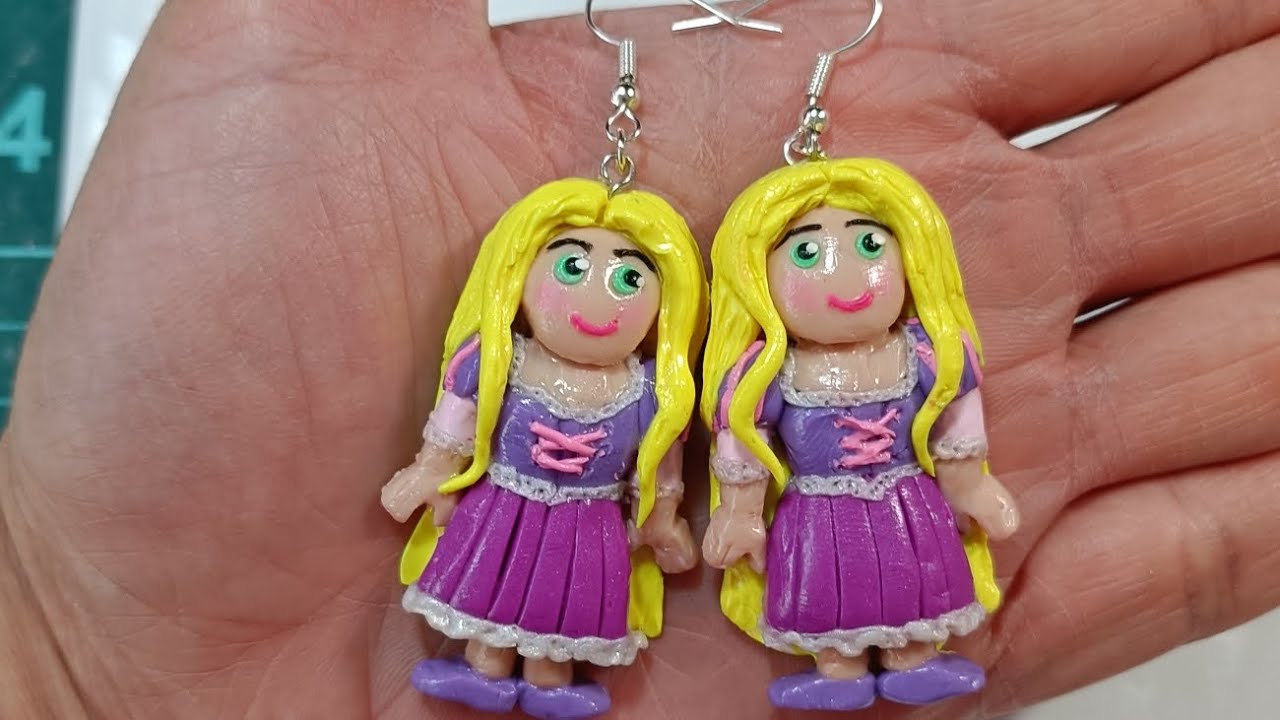 I'm showing you guys how I made my adorable polymer clay Disney Princess Rapunzel doll earrings.