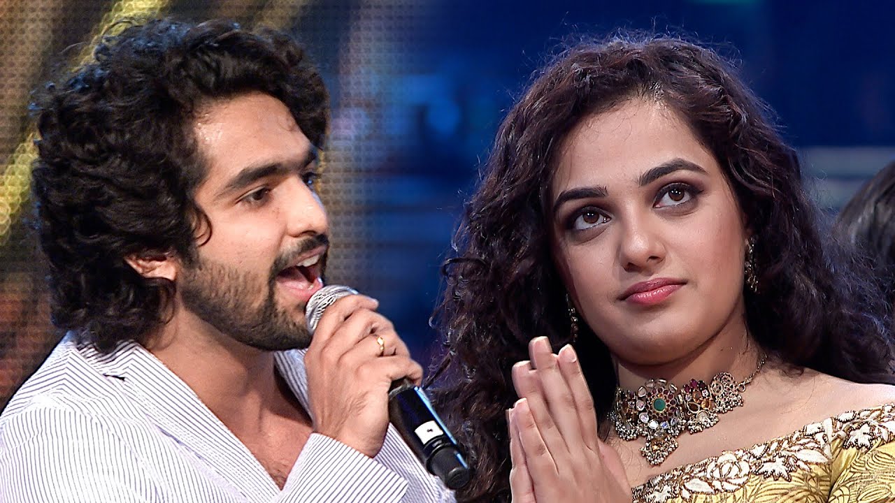 Nithya Menon vibing to Siddharth Menon's amazing live performance at South Movie Awards