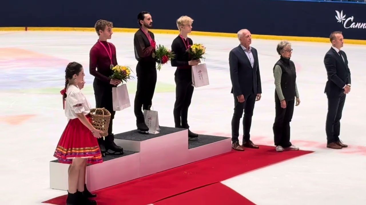2025 Ondrej Nepela Memorial men medal ceremony: Kevin Aymoz, Matteo Rizzo, Daniel Grassl