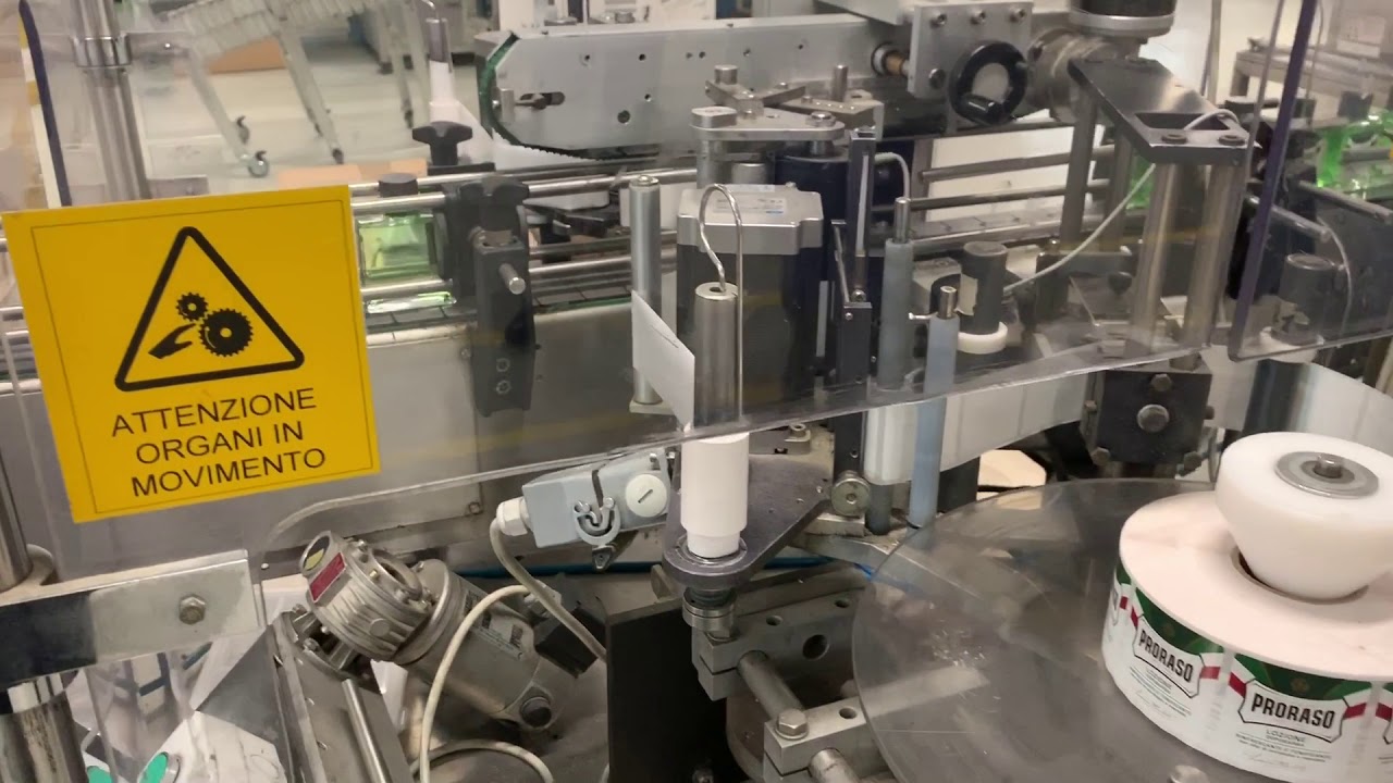 Proraso Aftershave splash being filled, labeled and packaged at the factory