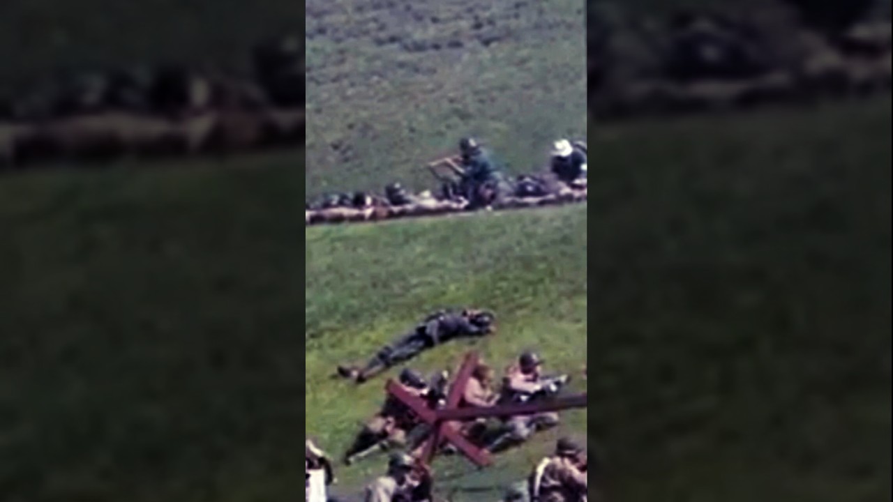 WW German Soldier Sniper Hit Mid Fire While Americans Charge Hill at D-Day Reenactment in Conneaut