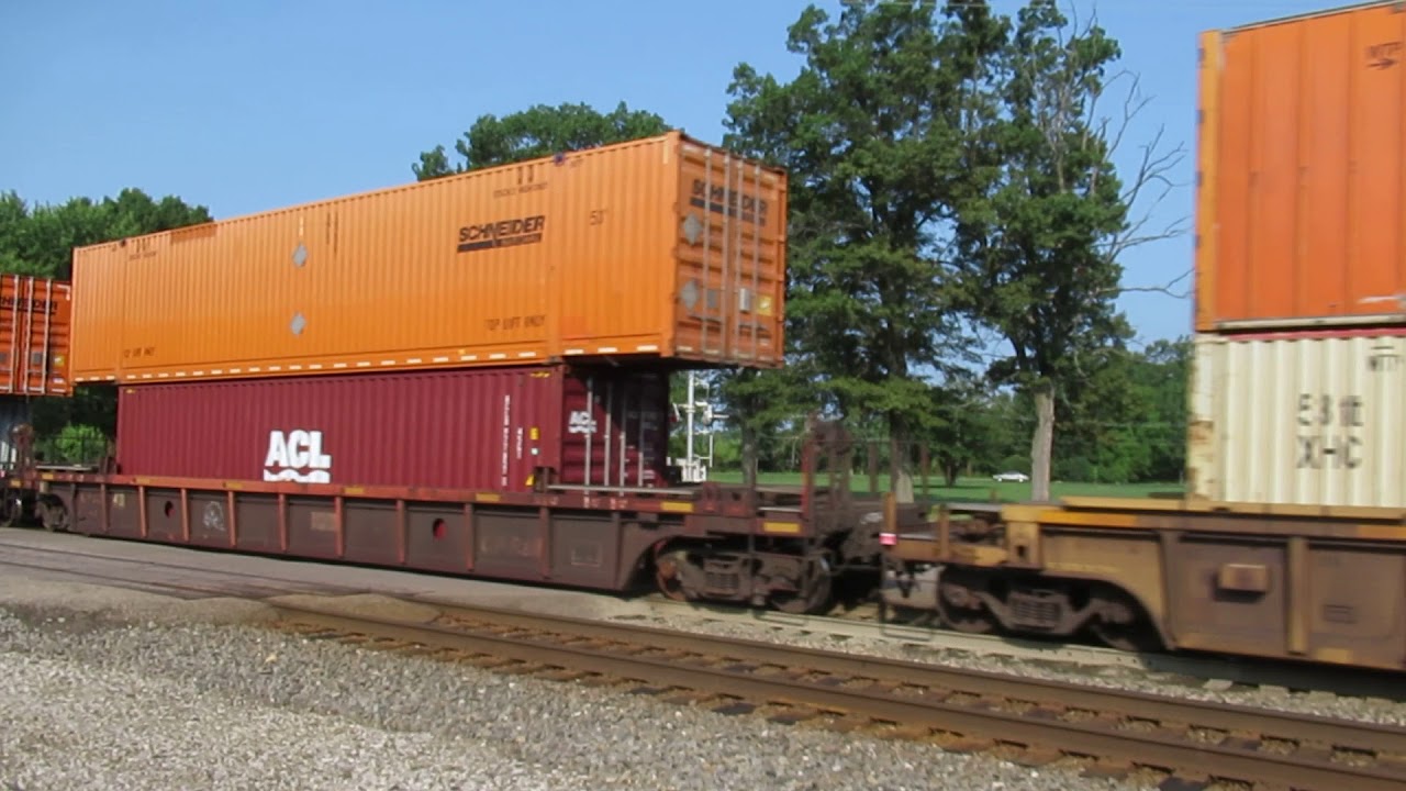 CN 5745, 8006 slowly pulling intermodal container train West by Vicksburg, MI