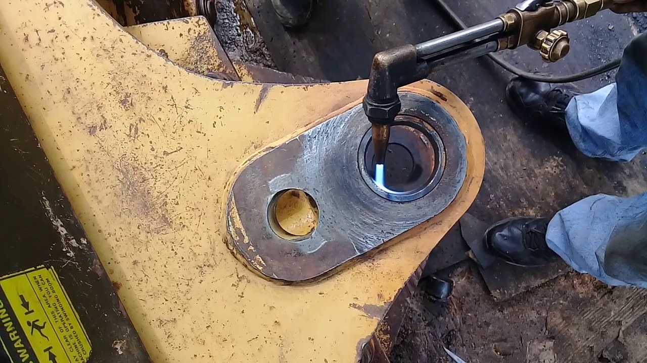 Extracción de bujes de retro 416b caterpillar
