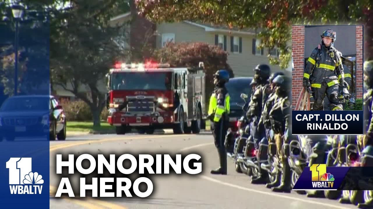 Hundreds of fire vehicles line road for funeral procession