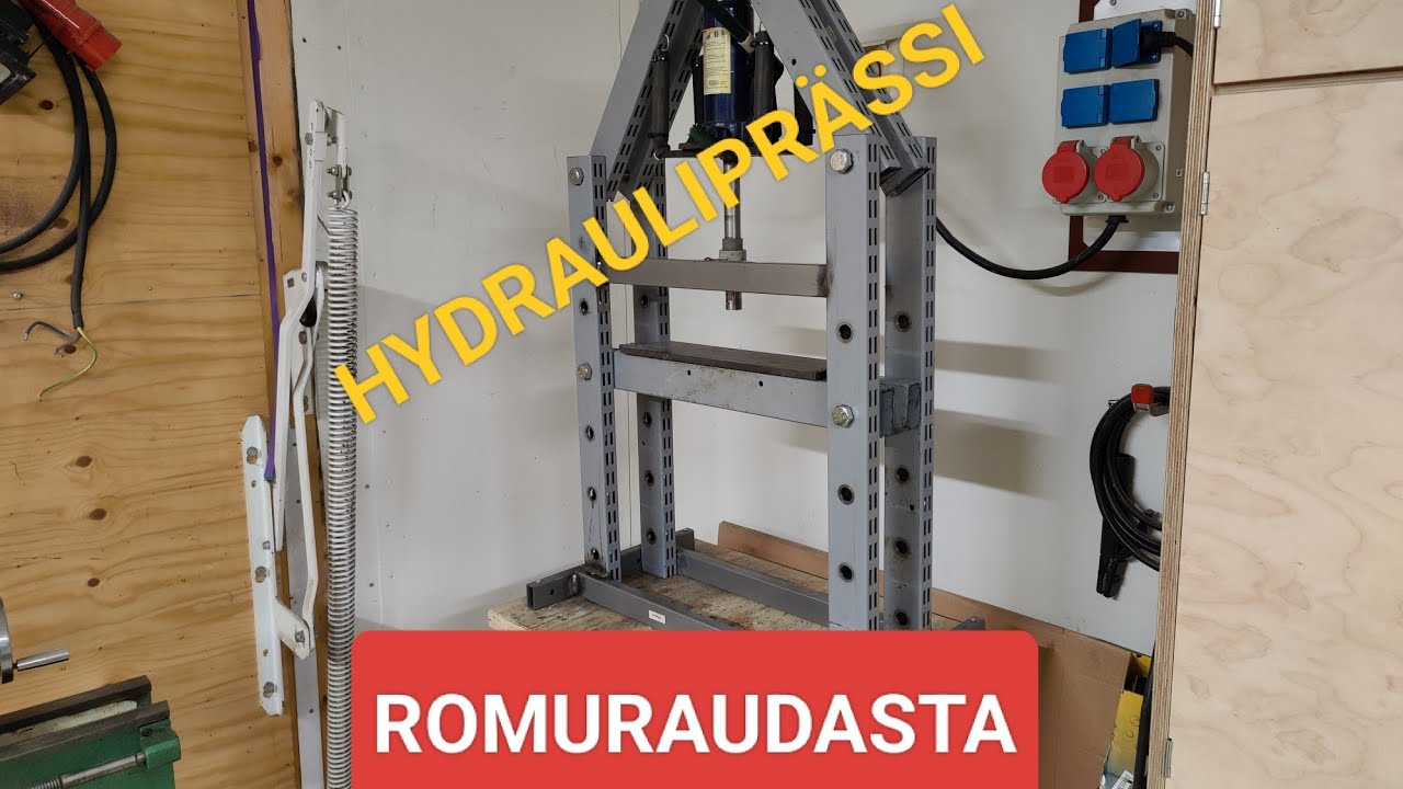 Pieni hydrauliprässi romuraudasta