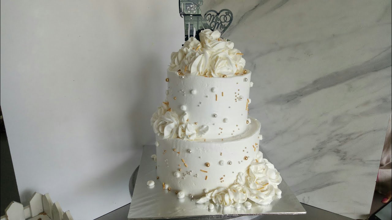 cara hias kue pengantin warna putih. #Weddingcake #whitecake