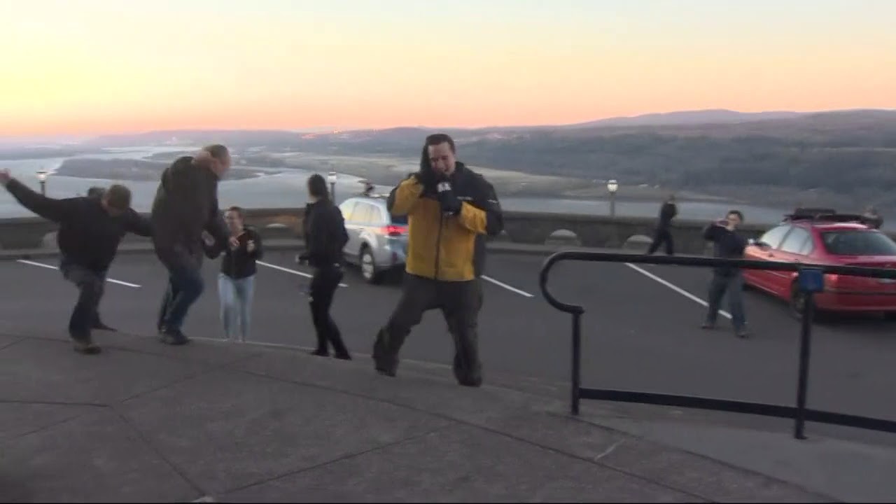 Strong winds blow KGW's Brian Brennan at Crown Point Vista House