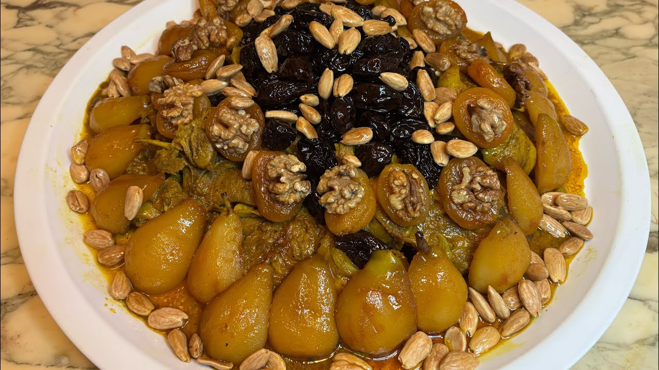 Tajine d’agneau aux pruneaux abricots poires confit amandes recette 