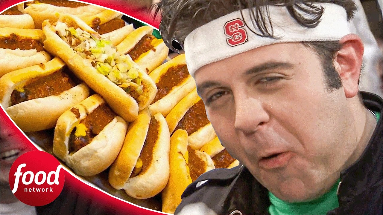 Adam Richman DESTROYS 16 North Carolina Chilli Hot Dogs At The Roast Grill! | Man V. Food