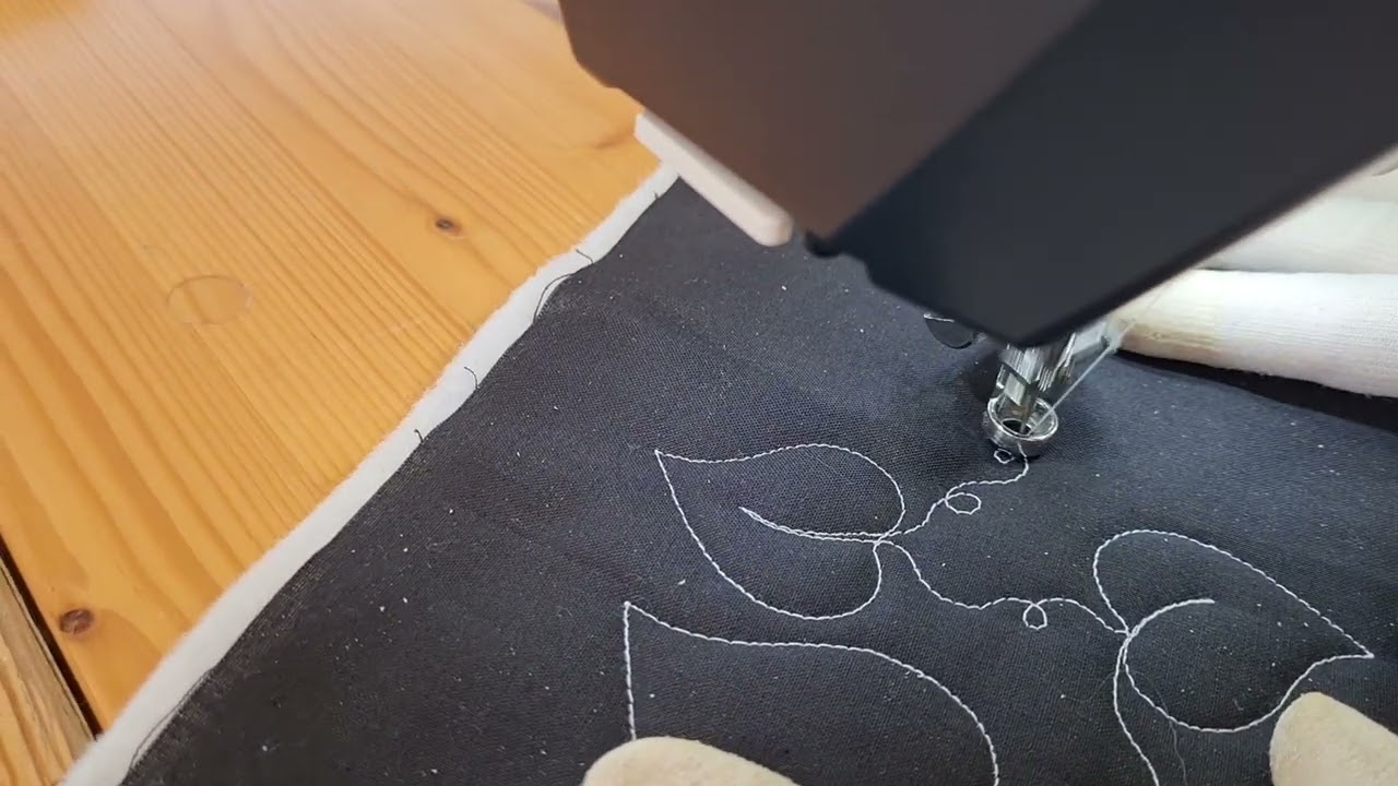 Linealquilten: Ranke mit Herzblättern