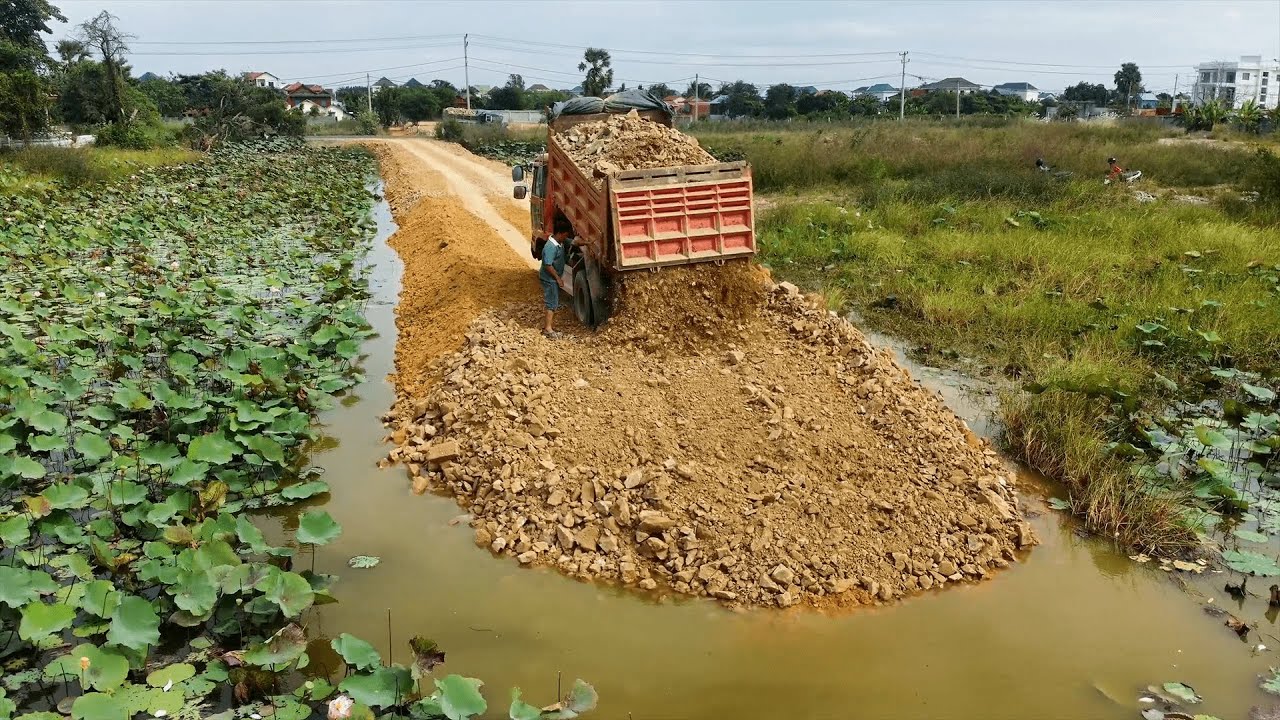Awesome Landfill! Making Long Road with Dump Truck & Komatsu D20P Dozer Pushing Stone into Water