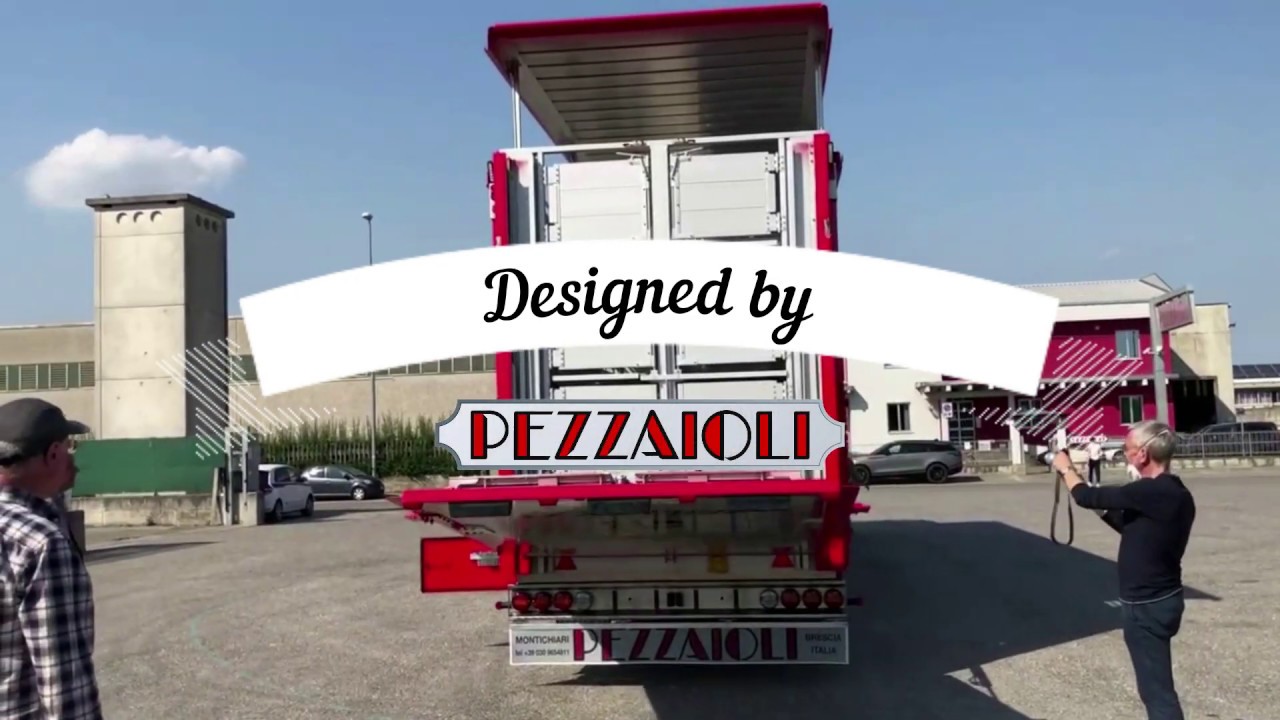 A new pig transport semitrailer with 4 loading decks of which 3 are fixed and one is hydraulic.