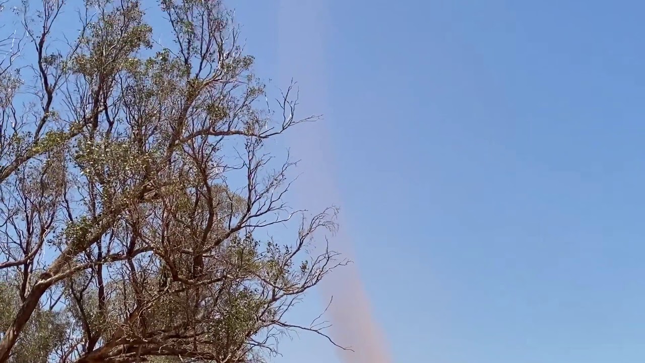 Tow Paragliding With dust devil