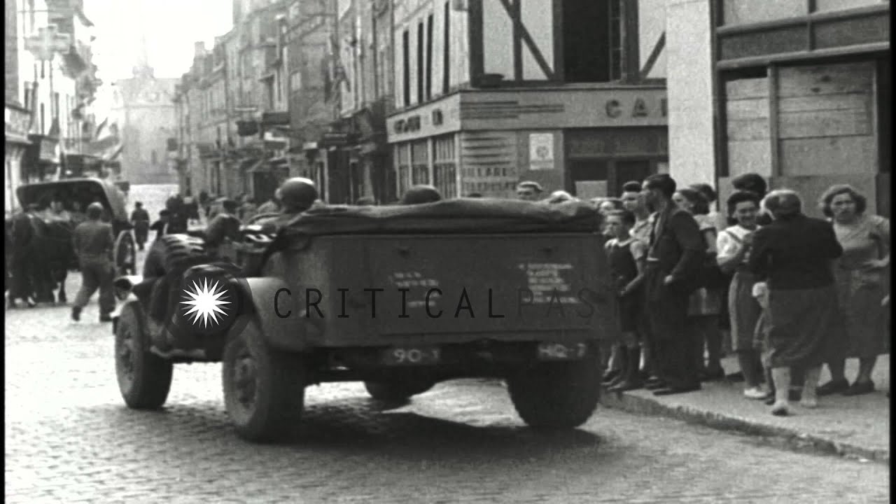 French civilians cheer as Vehicles of the 90th Infantry Division move on road in ...HD Stock Footage