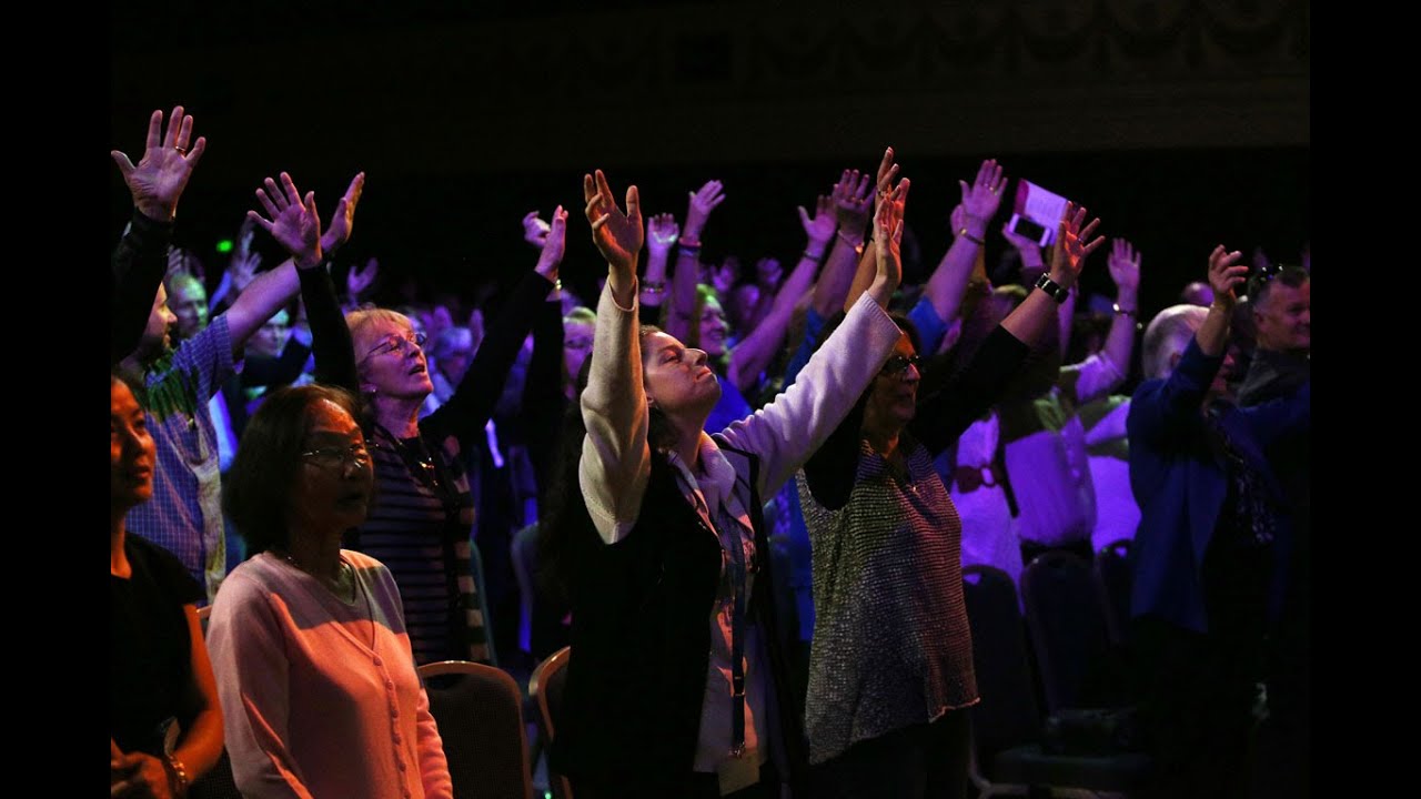 ONE TEAM, ONE VOICE team building, group singing workshop presented by Creative Universe